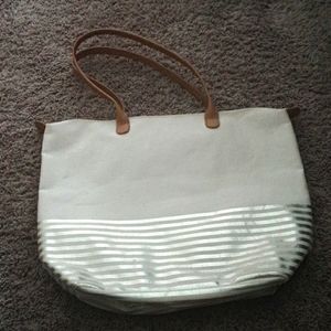 Selling a purse.